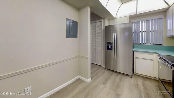 a view of walk in closet with window