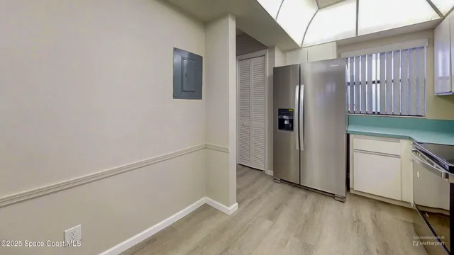 a view of walk in closet with window