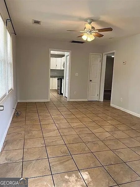 2874 Cheney Street, Unit 1 East Point, GA 30344 - Photo 2 of 7 a view of an empty room and window