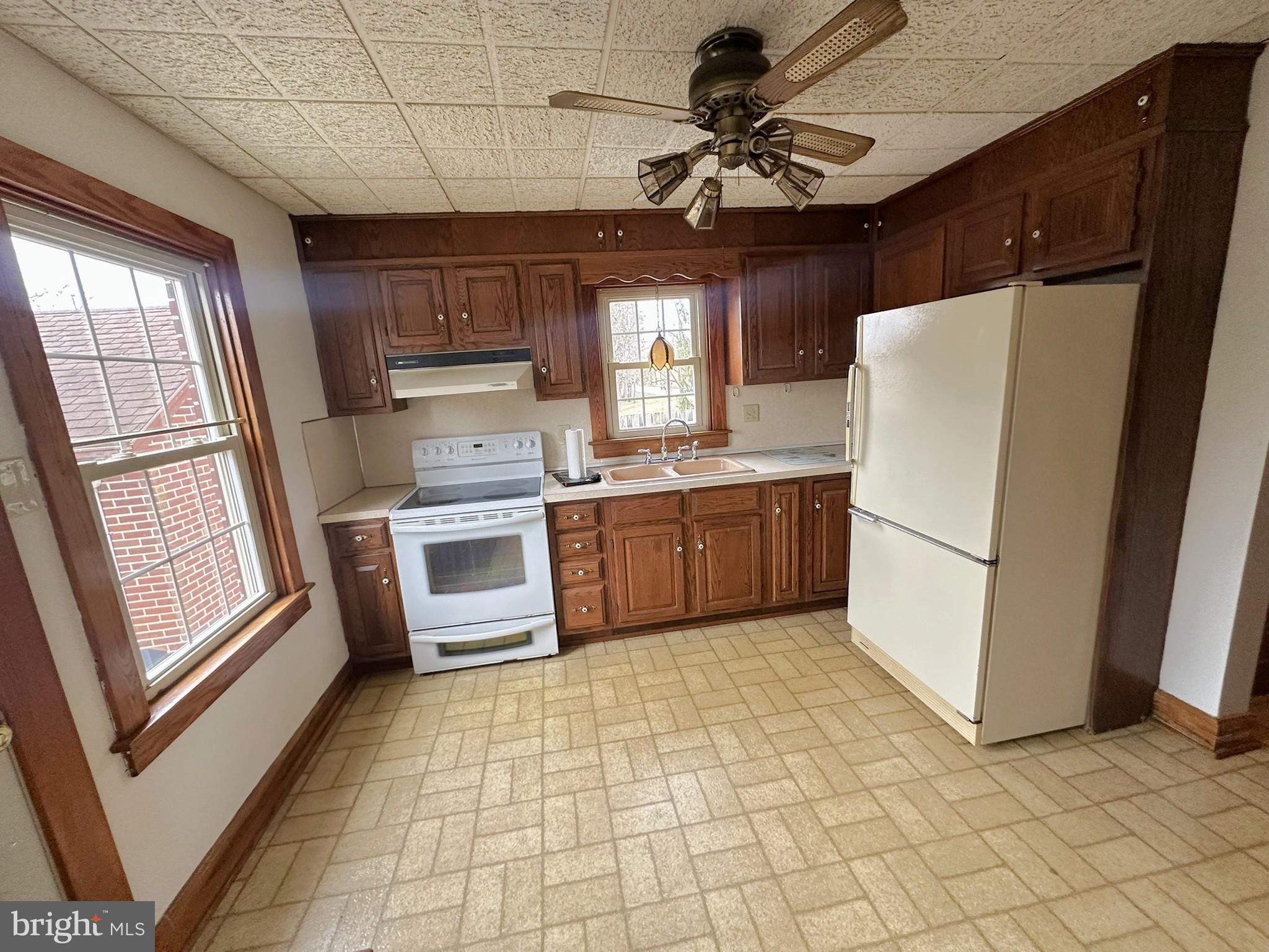 6751 York Road Spring Grove, PA 17362 - Photo 19 of 50 a kitchen with stainless steel appliances a refrigerator and a stove top oven