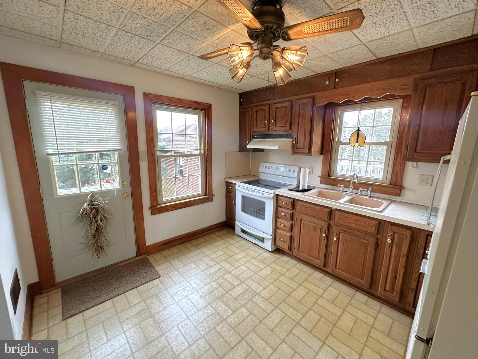6751 York Road Spring Grove, PA 17362 - Photo 23 of 50 a kitchen with stainless steel appliances granite countertop a stove sink and cabinets