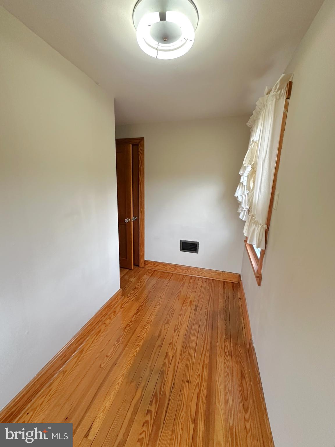 6751 York Road Spring Grove, PA 17362 - Photo 26 of 50 a view of empty room with wooden floor