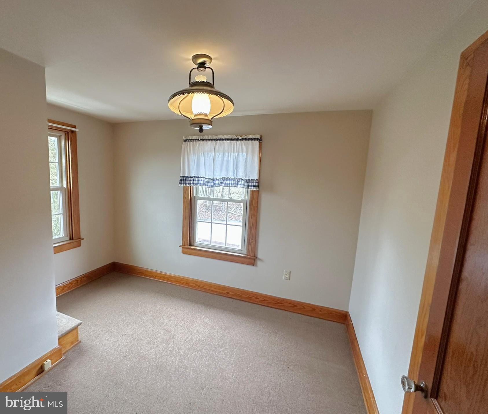 6751 York Road Spring Grove, PA 17362 - Photo 34 of 50 an empty room with windows and fan