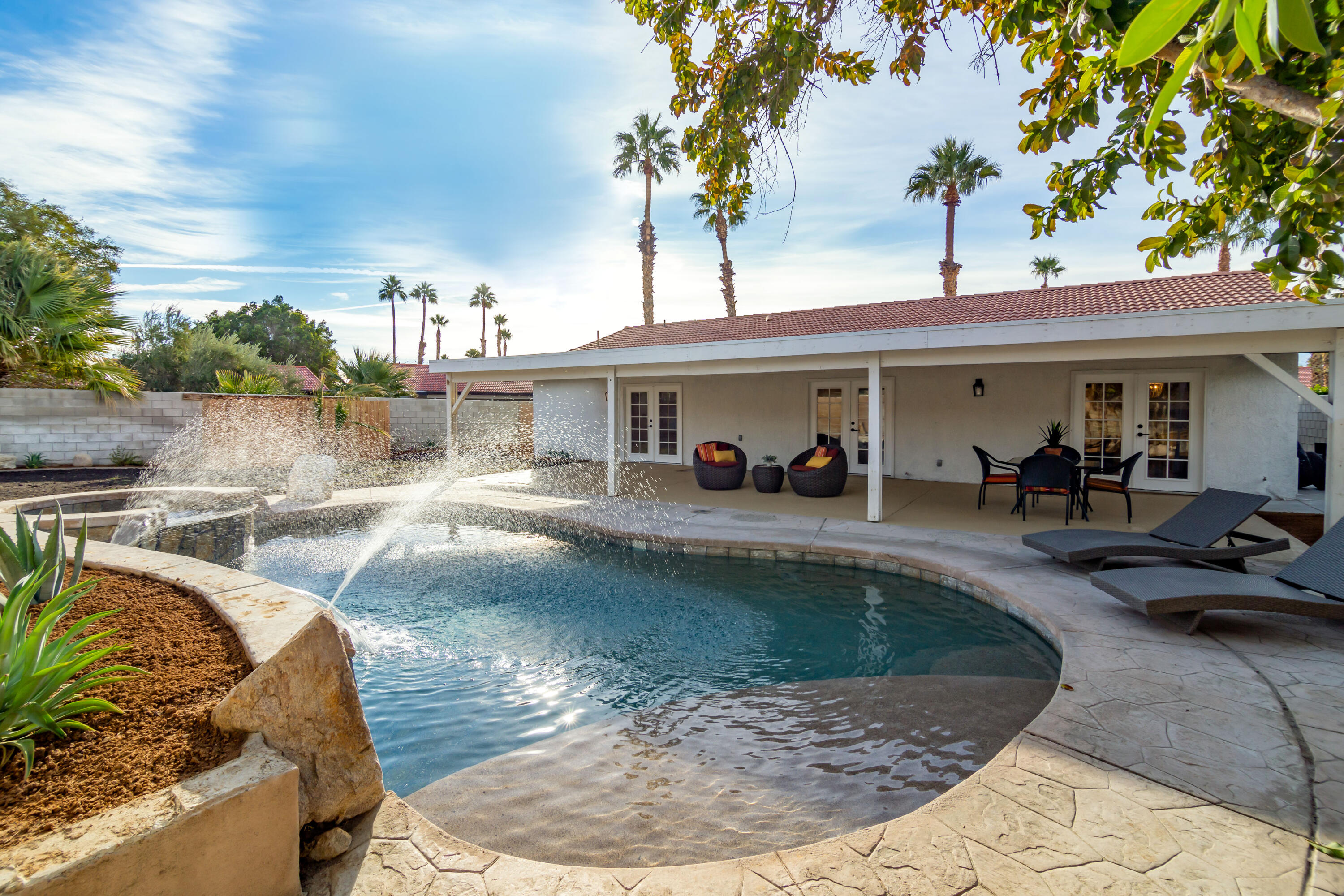 67420 Rango Road Cathedral City, CA 92234 - Photo 1 of 36 a view of a swimming pool with a patio