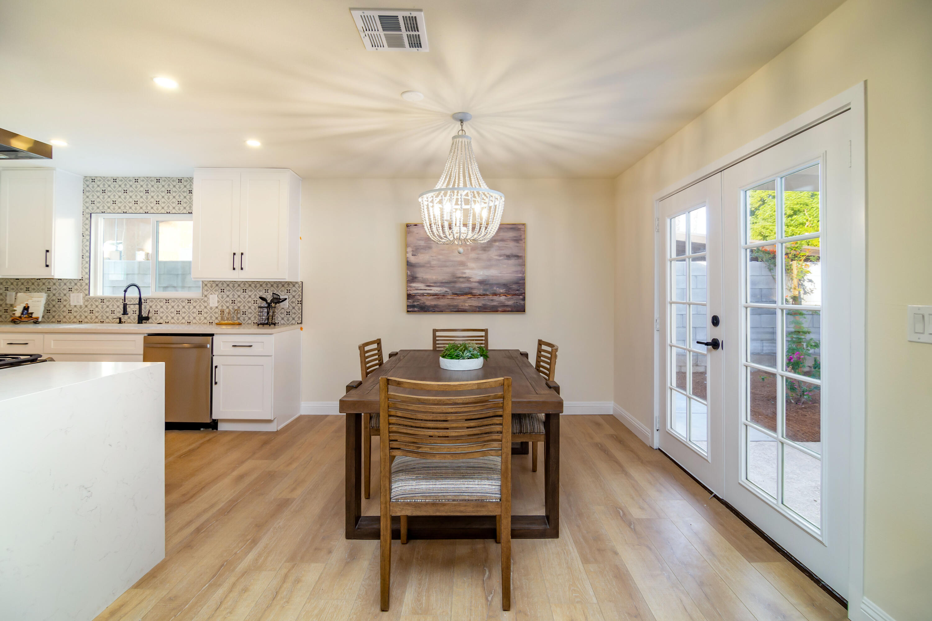 67420 Rango Road Cathedral City, CA 92234 - Photo 12 of 36 a dining room with furniture and window
