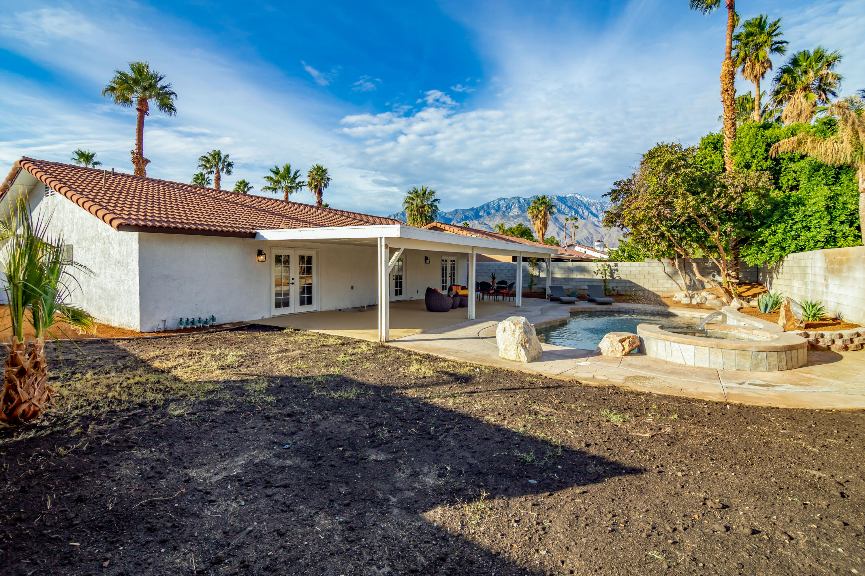 67420 Rango Road Cathedral City, CA 92234 - Photo 32 of 36 a view of a house with a yard