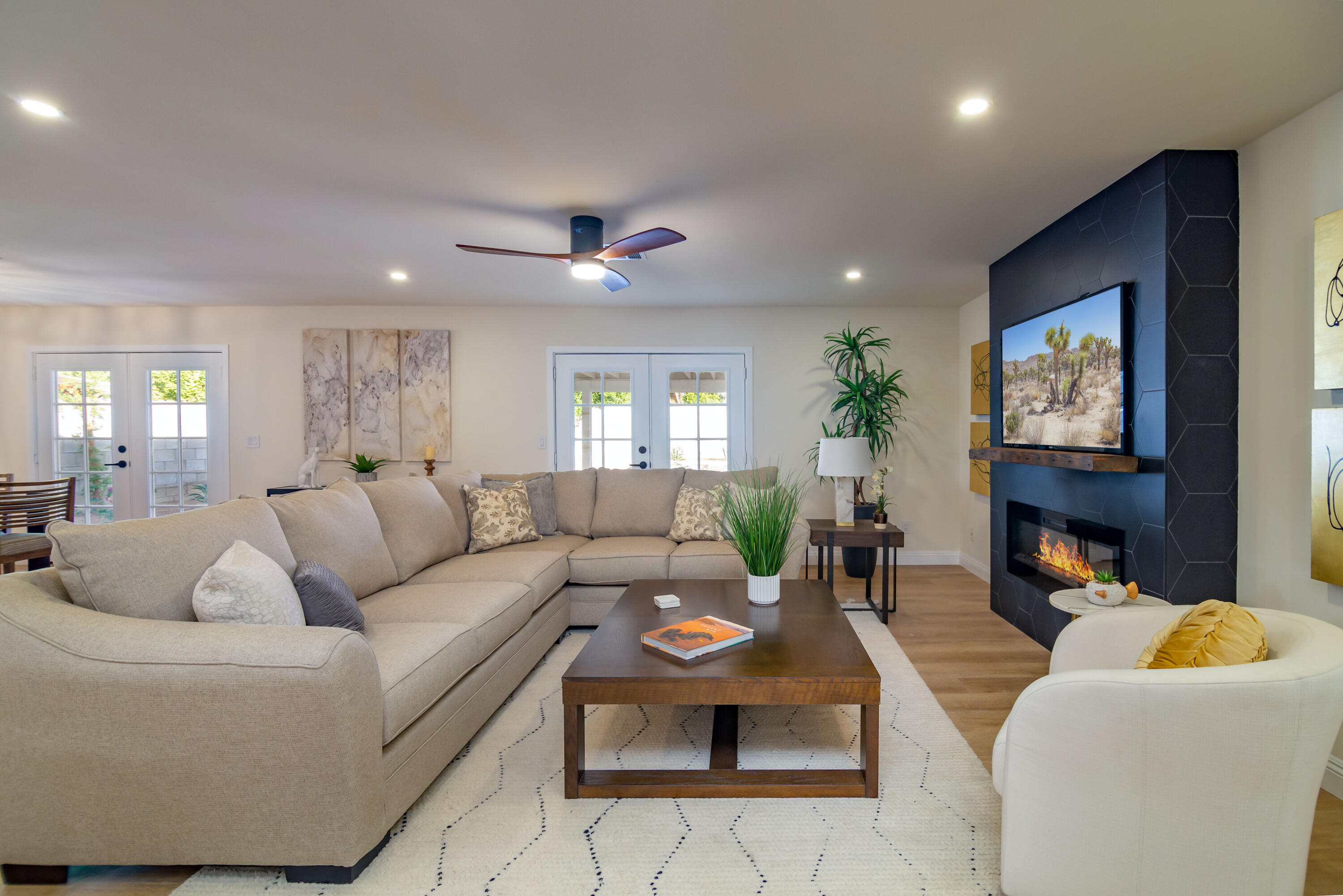 67420 Rango Road Cathedral City, CA 92234 - Photo 7 of 36 a living room with furniture and a fireplace