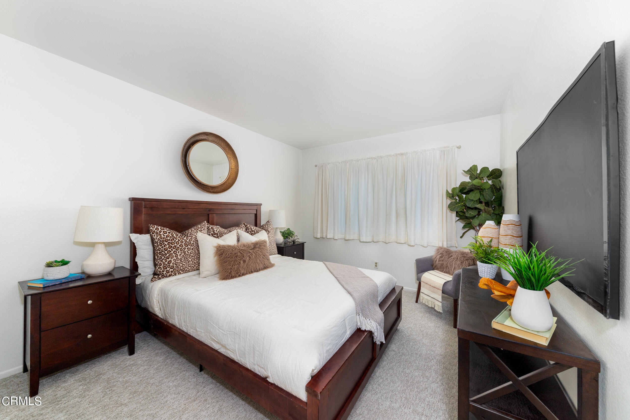 24100 Ave Rancheros, Unit G Diamond Bar, CA 91765 - Photo 15 of 20 a bedroom with bed and a potted plant