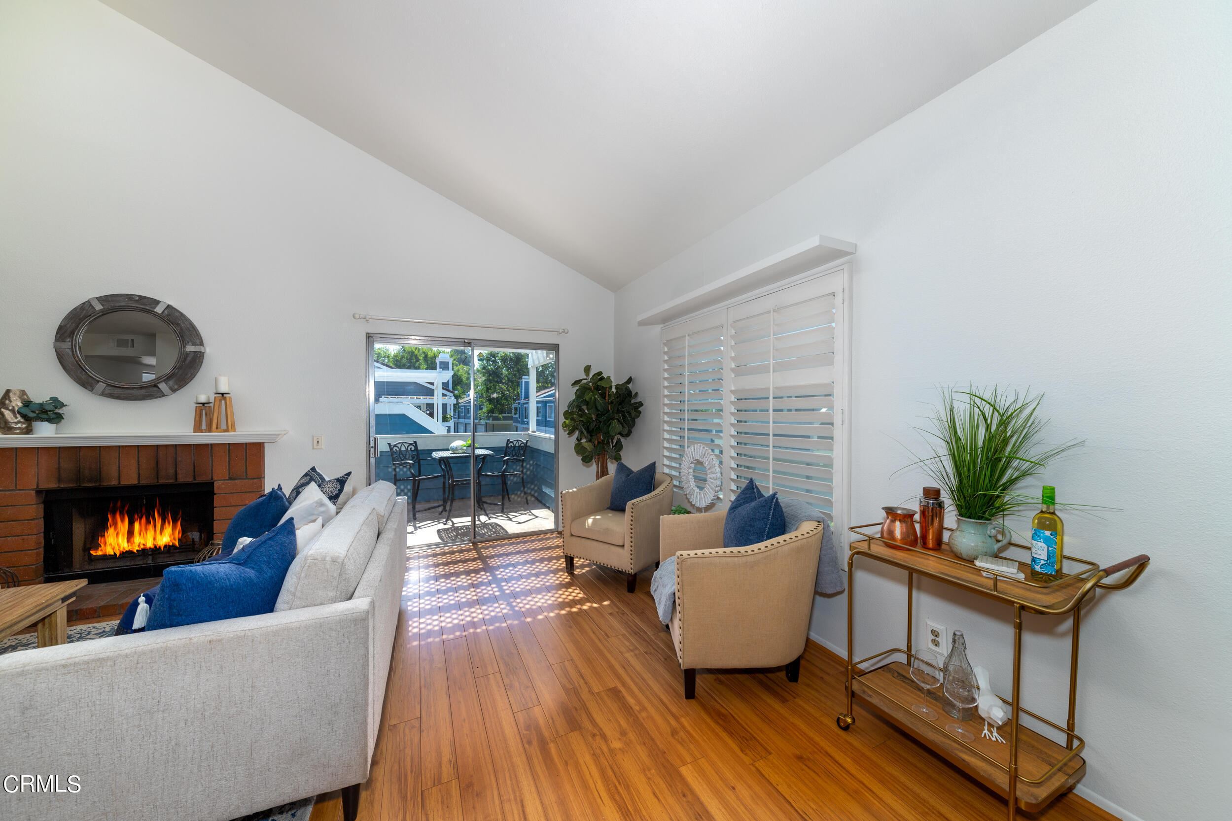 24100 Ave Rancheros, Unit G Diamond Bar, CA 91765 - Photo 3 of 20 a living room with furniture and a fireplace