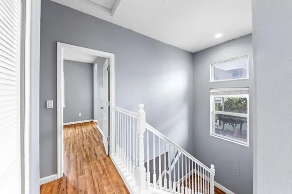 a bedroom with a bed furniture and a window