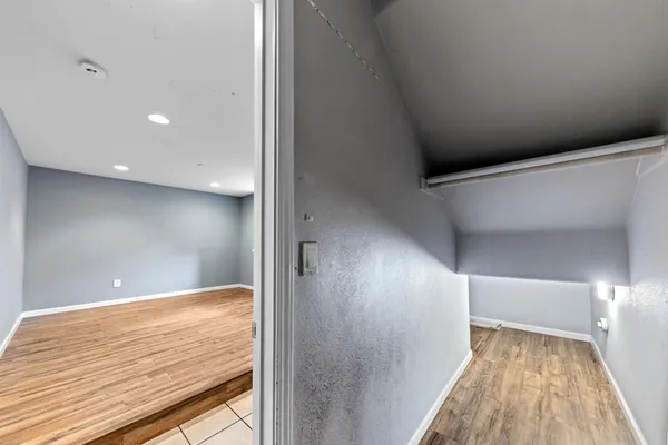 a picture of wall with a white wall and a picture