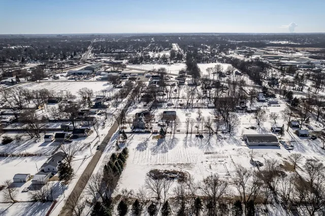 an aerial view of residential building with parking space