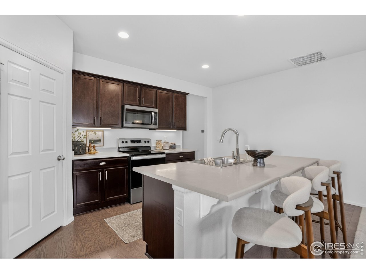 6734 Grainery Road Timnath, CO 80547 - Photo 10 of 44 Large Kitchen Island for Gathering