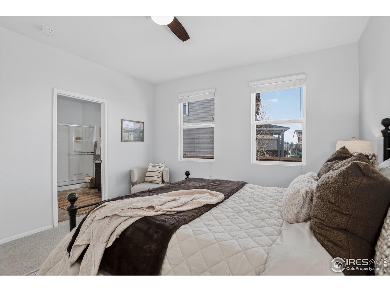 6734 Grainery Road Timnath, CO 80547 - Photo 18 of 44 Primary Bedroom