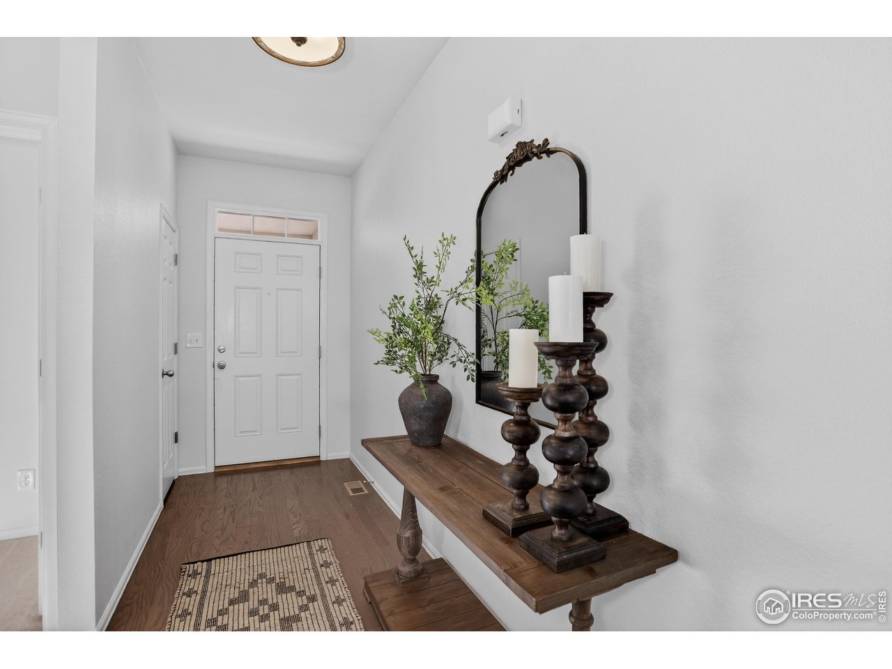 6734 Grainery Road Timnath, CO 80547 - Photo 4 of 44 Foyer