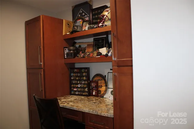 a view of a wooden door of the house