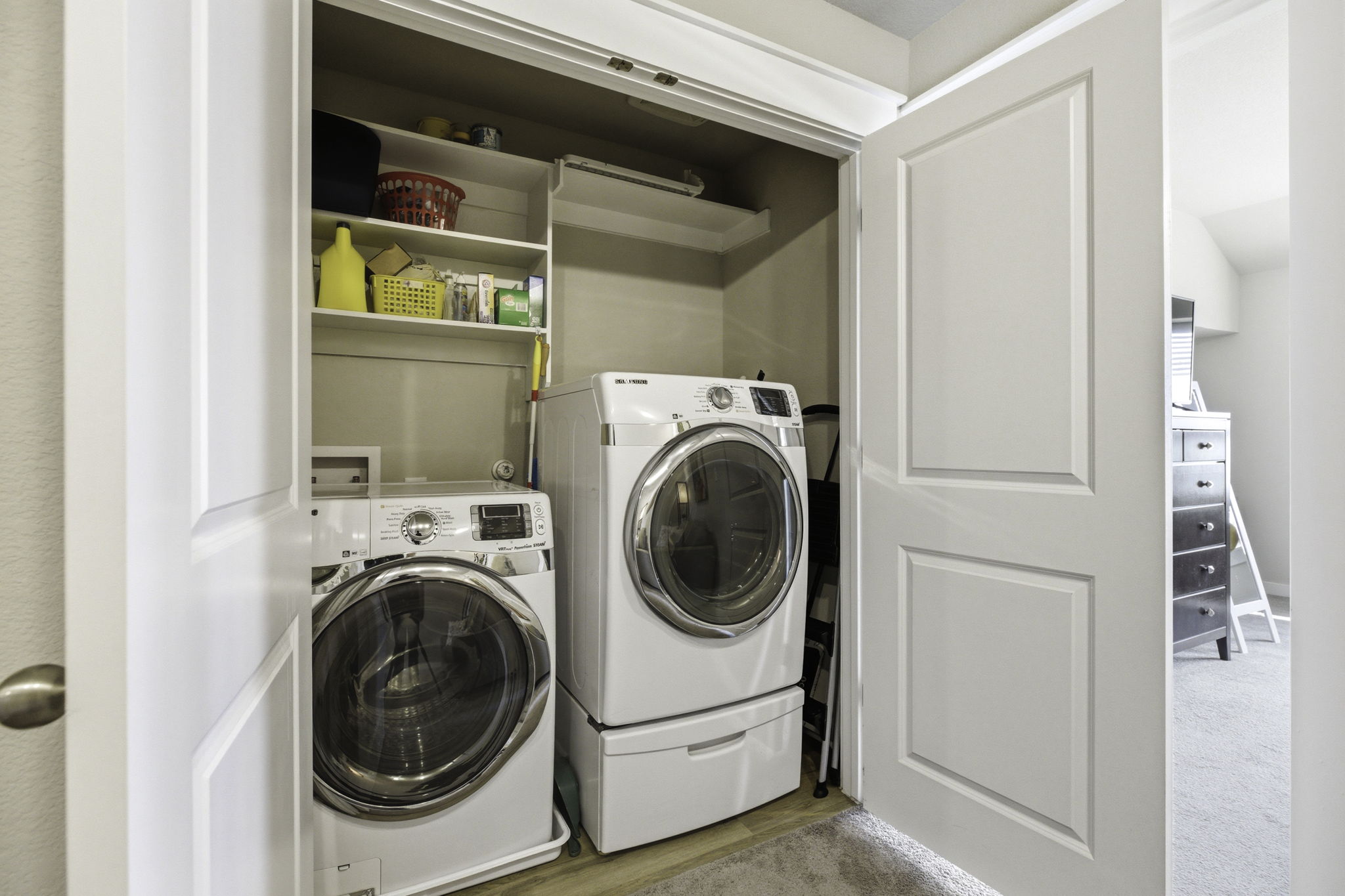 17205 Leafroller Drive, Unit B Pflugerville, TX 78660 - Photo 25 of 32 a utility room with dryer and washer