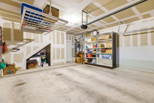 a view of an empty room with stairs