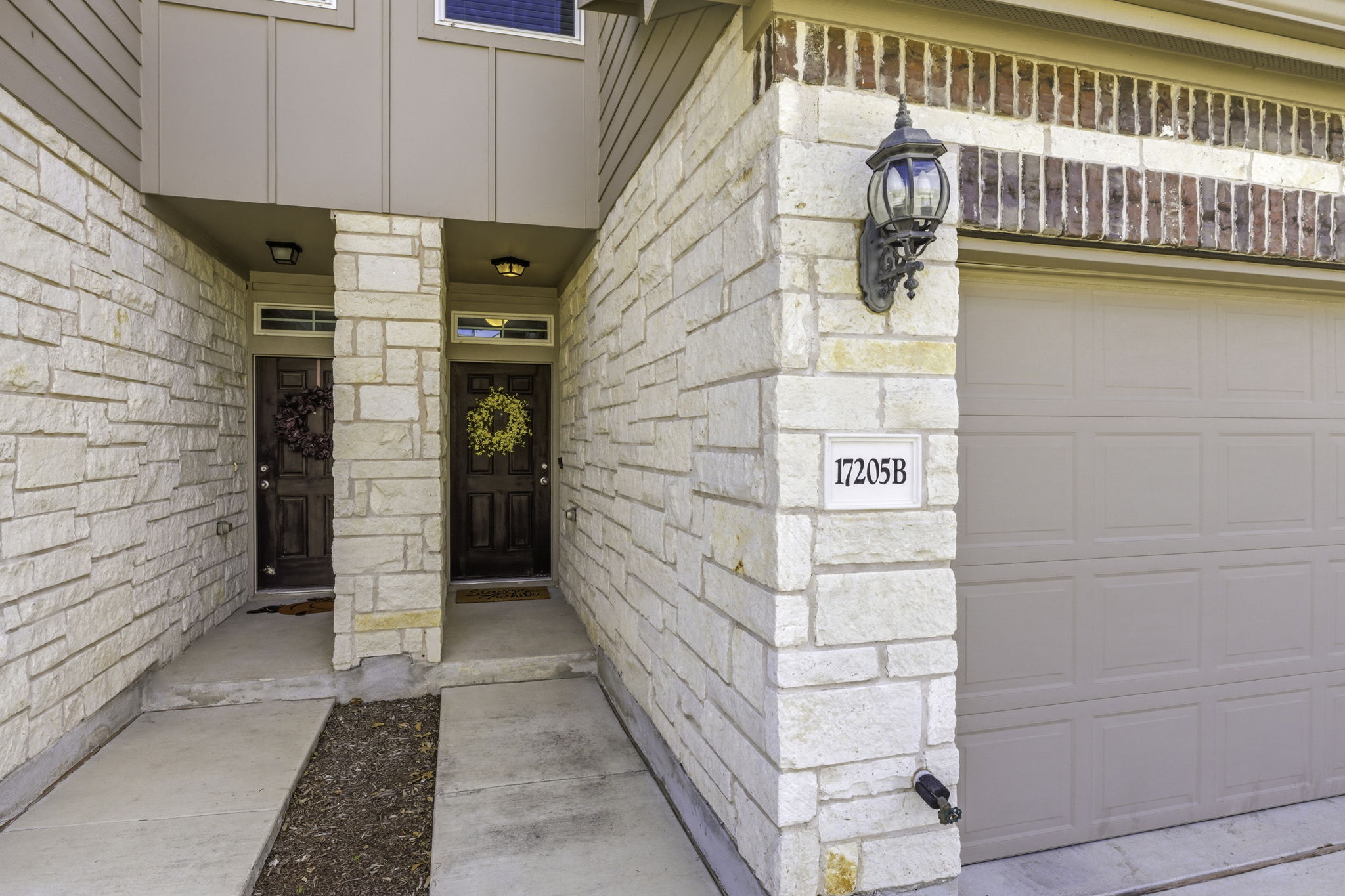 17205 Leafroller Drive, Unit B Pflugerville, TX 78660 - Photo 3 of 32 a view of a wooden door