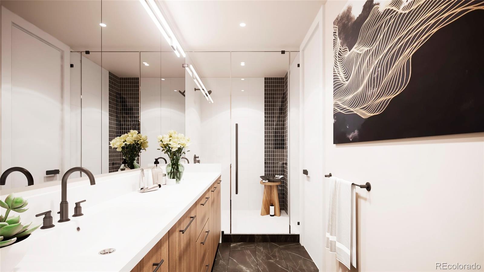 a bathroom with a sink a mirror and a shower