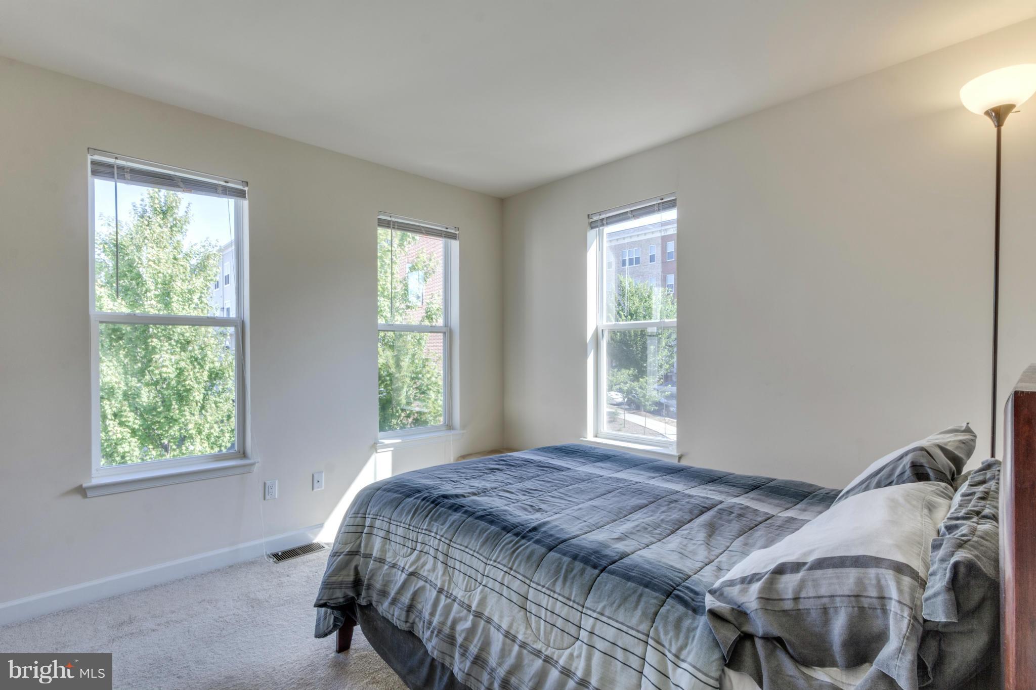 2524 Sheridan Road Southeast Washington, DC 20020 - Photo 16 of 20 a bedroom with a bed and window