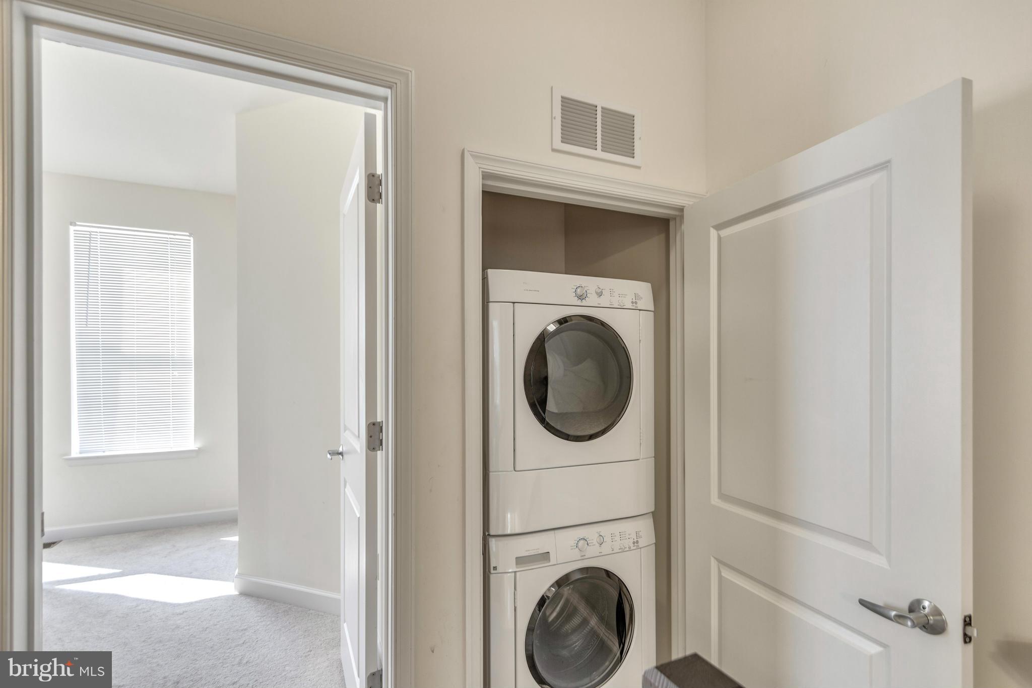2524 Sheridan Road Southeast Washington, DC 20020 - Photo 18 of 20 a view of a hallway with washer and dryer