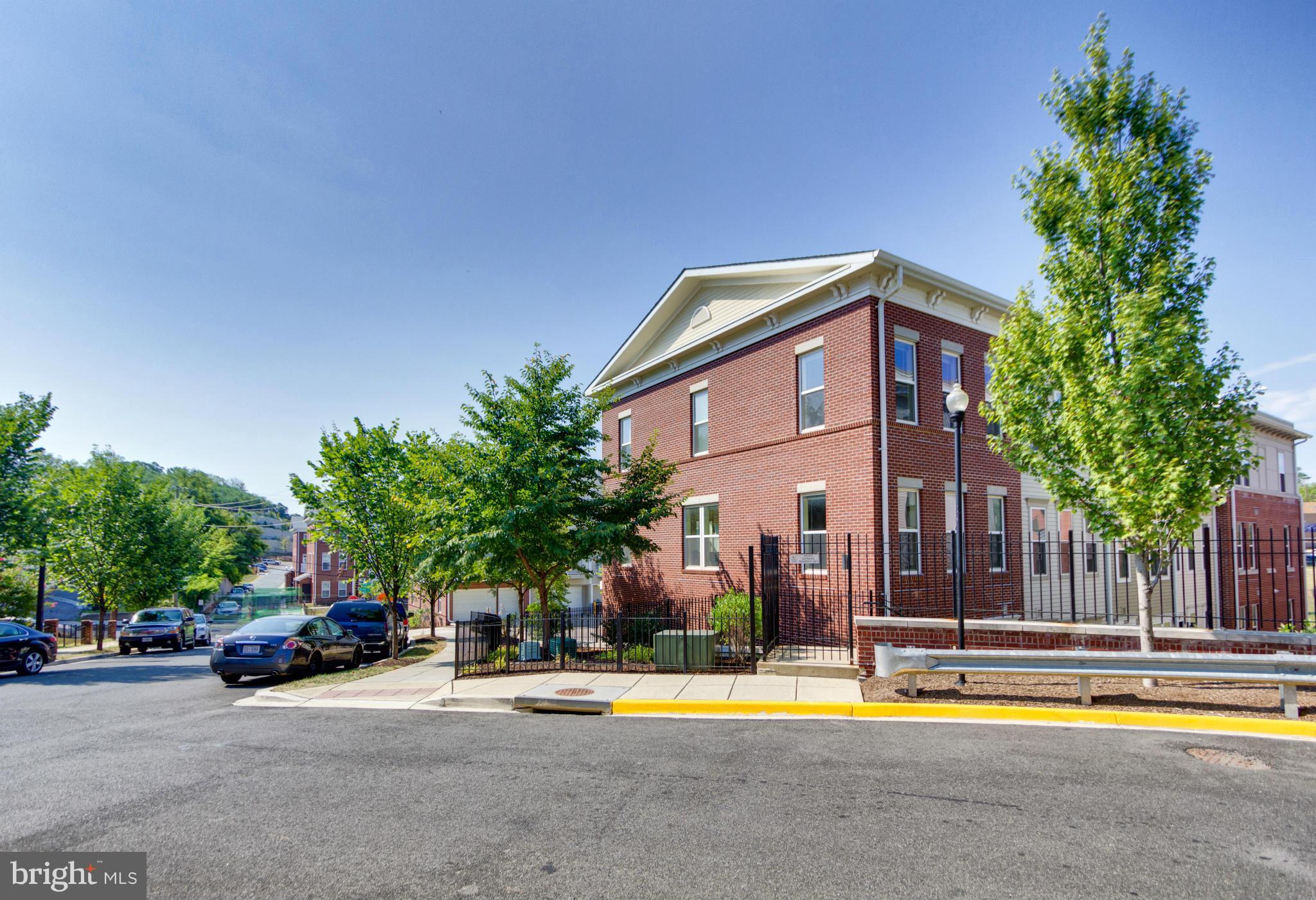 2524 Sheridan Road Southeast Washington, DC 20020 - Photo 19 of 20 a view of a building with a swimming pool and a chairs and couch