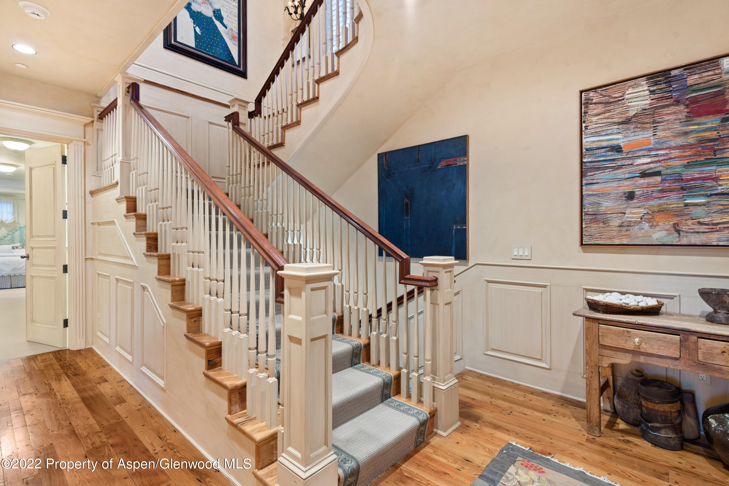 926 Willoughby Way Aspen, CO 81612 - Photo 21 of 47 a view of entryway and hall with wooden floor