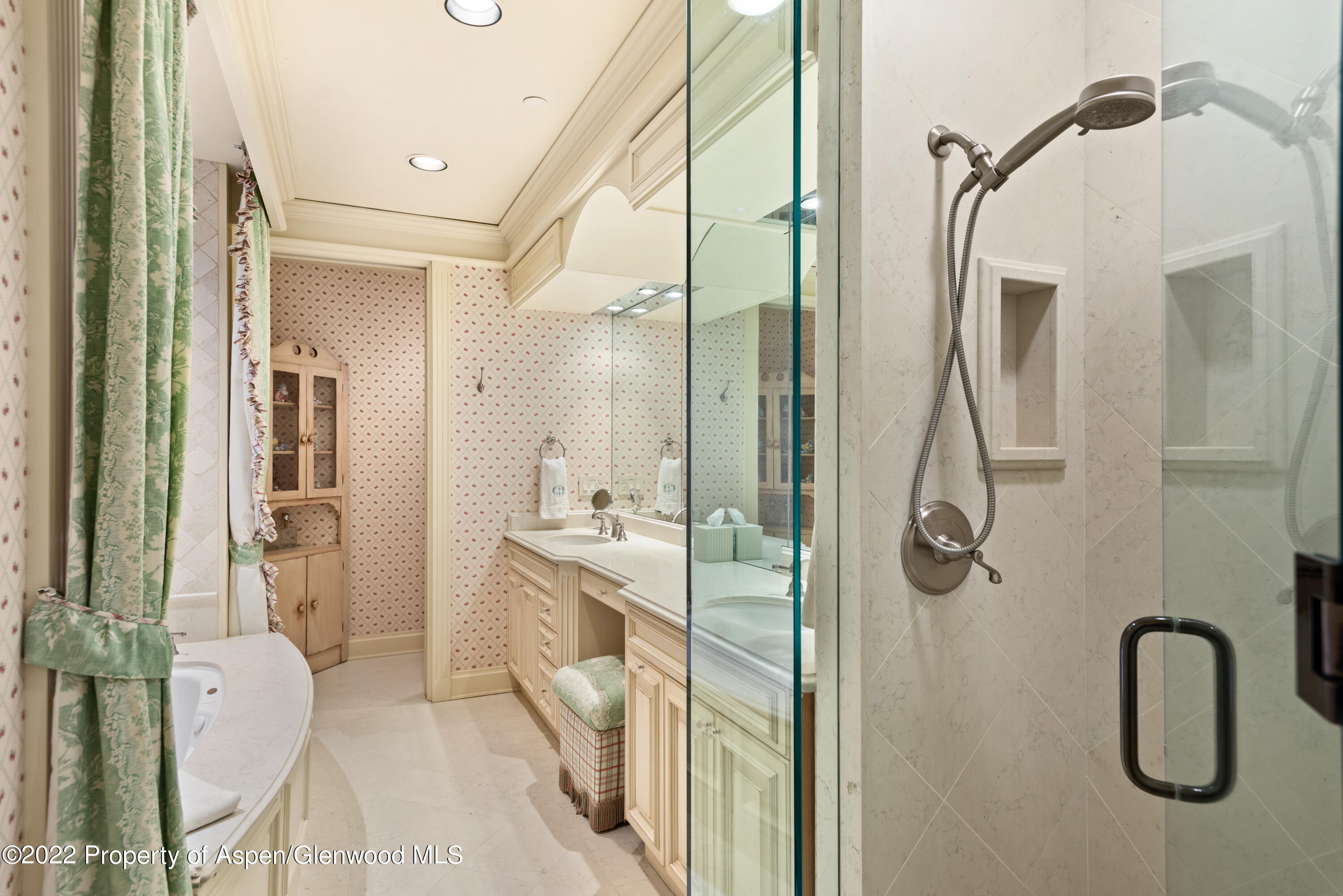 926 Willoughby Way Aspen, CO 81612 - Photo 27 of 47 a en suite bathroom with a granite countertop shower mirror and vanity