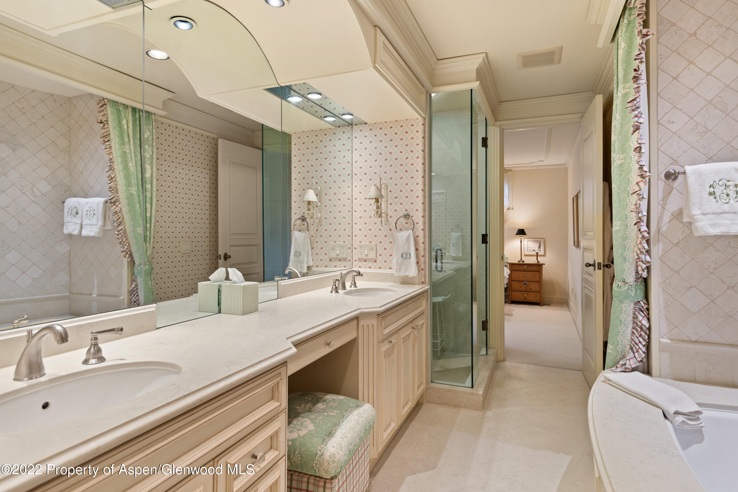 926 Willoughby Way Aspen, CO 81612 - Photo 28 of 47 a bathroom with a double vanity sink mirror and shower