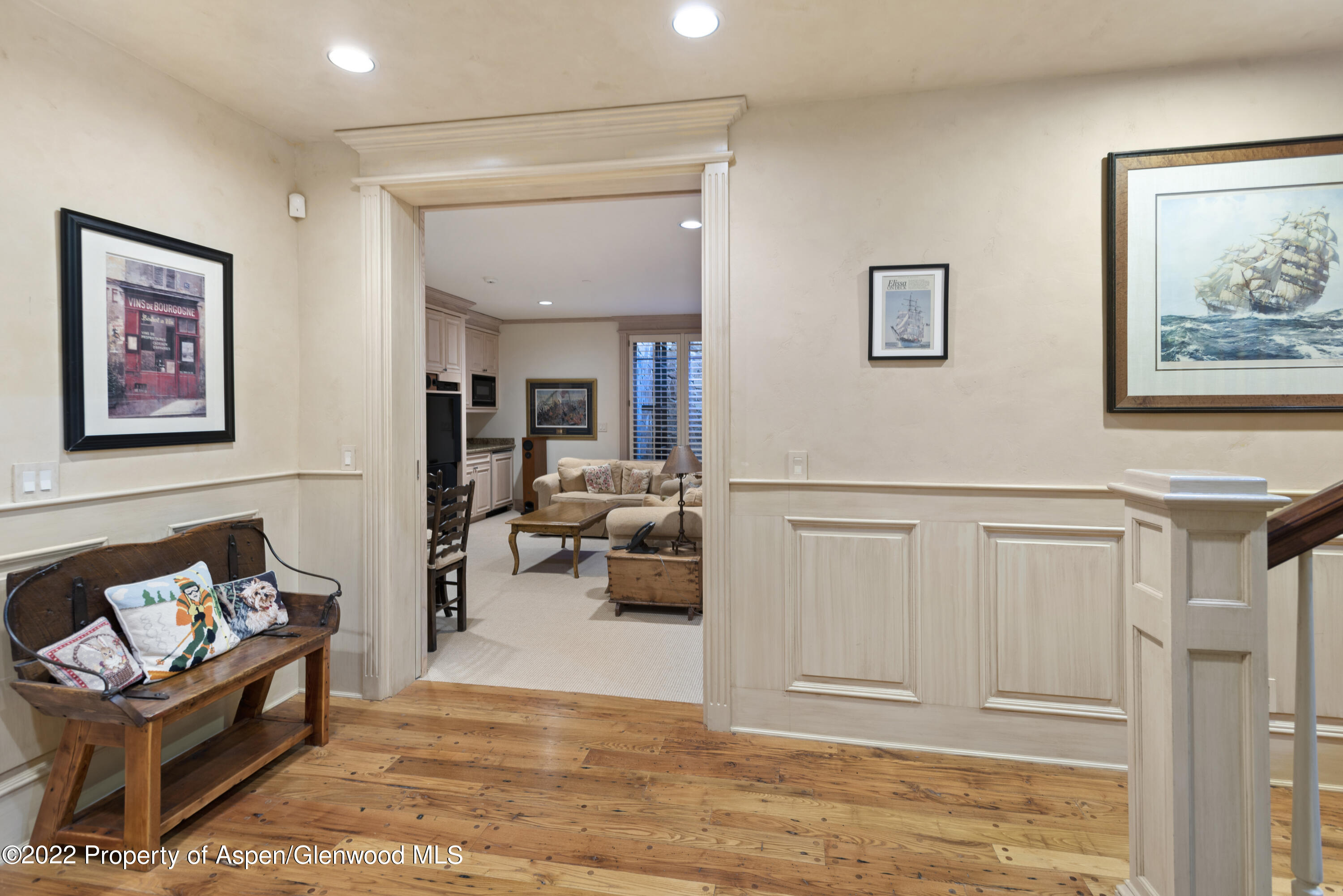 926 Willoughby Way Aspen, CO 81612 - Photo 33 of 47 a living room with furniture and wooden floor