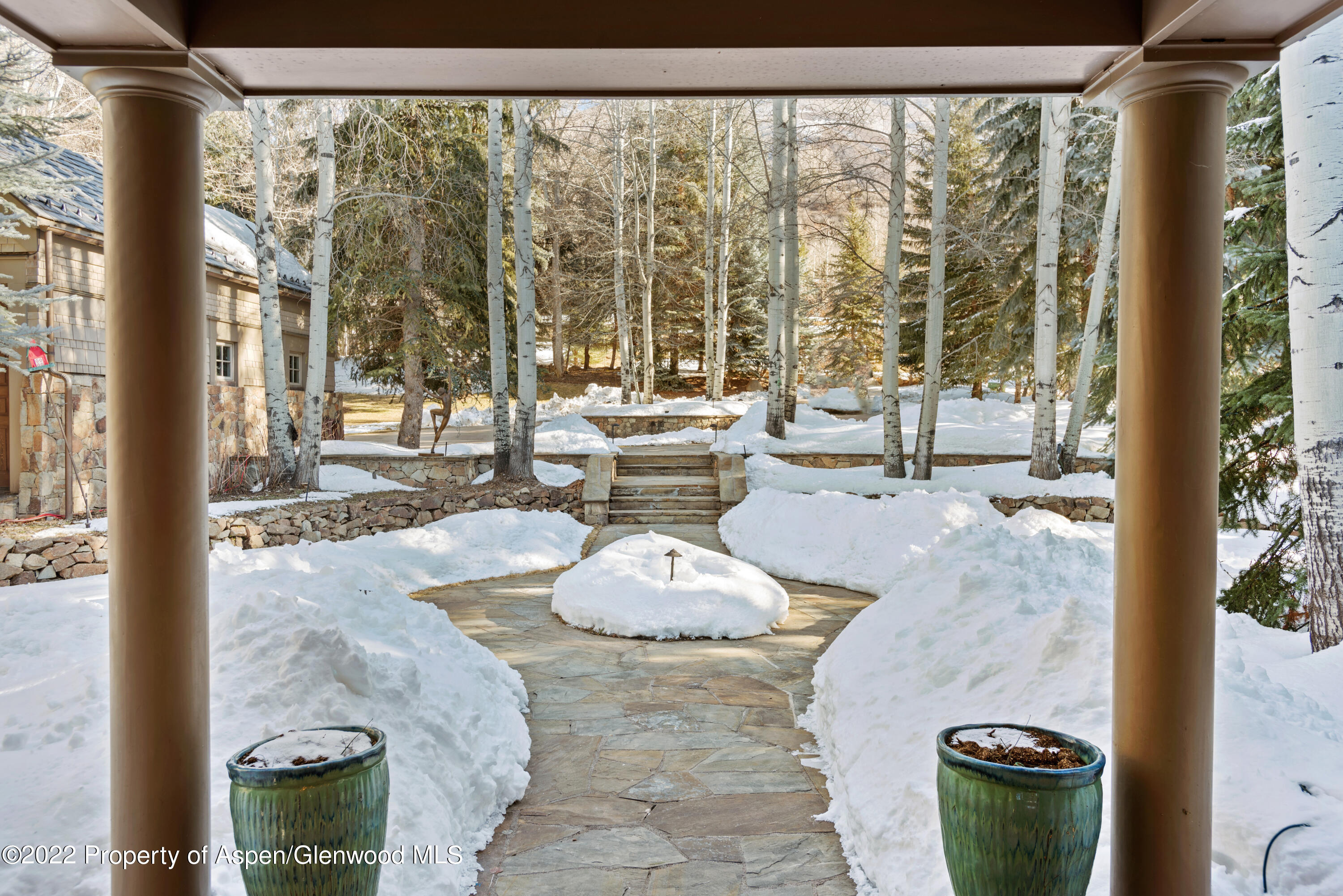 926 Willoughby Way Aspen, CO 81612 - Photo 43 of 47 a living room with a large window and furniture