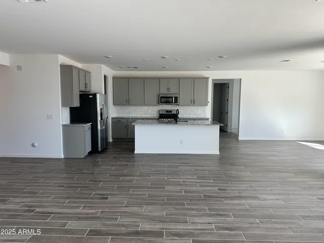 a view of a kitchen with a sink