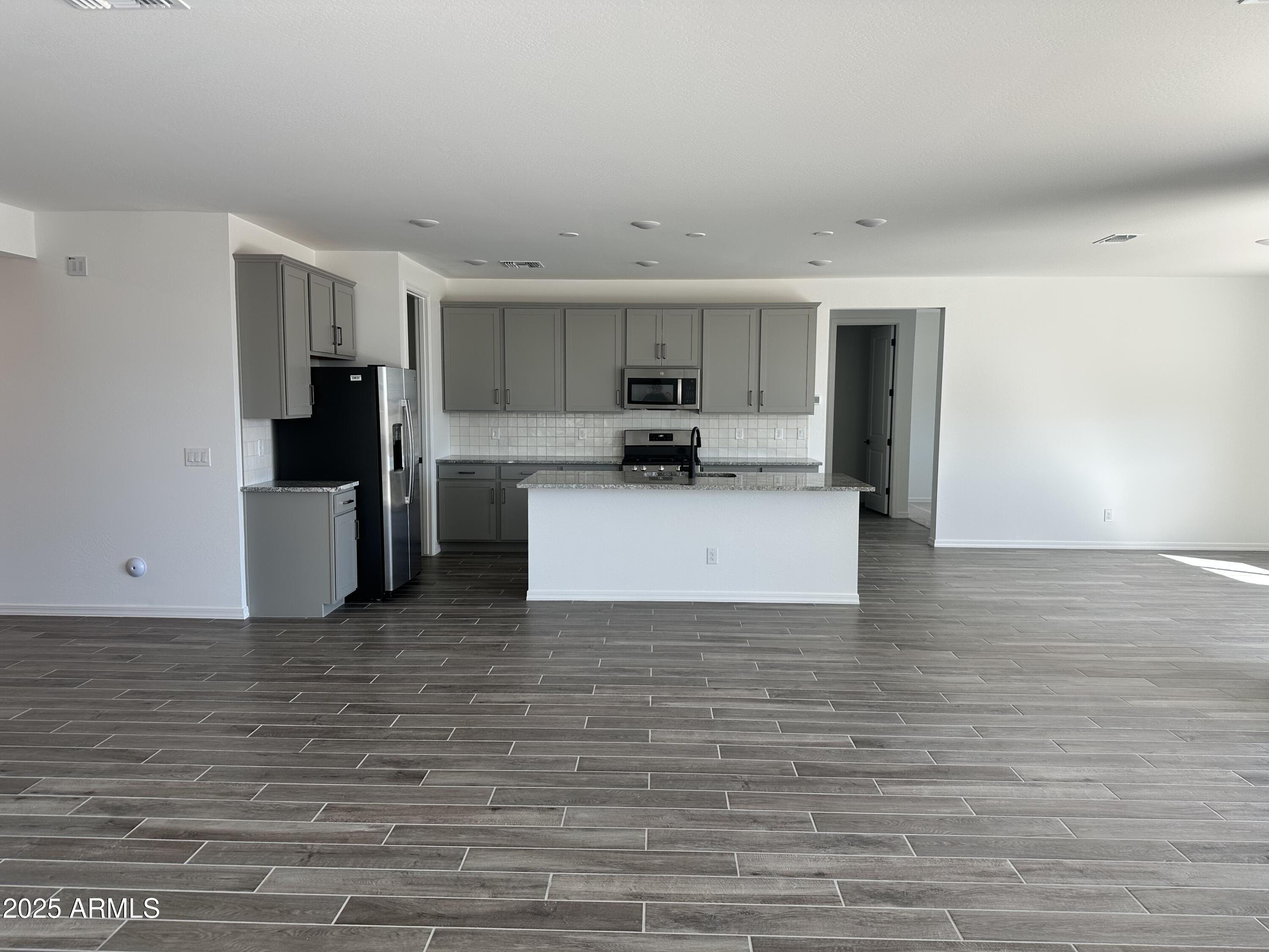 5535 West Hopi Trail Laveen, AZ 85339 - Photo 14 of 45 a view of a kitchen with a sink