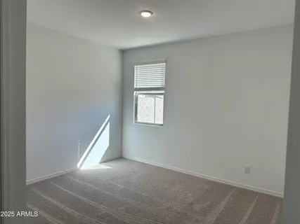 a view of a window in an empty room