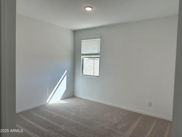 a view of a window in an empty room