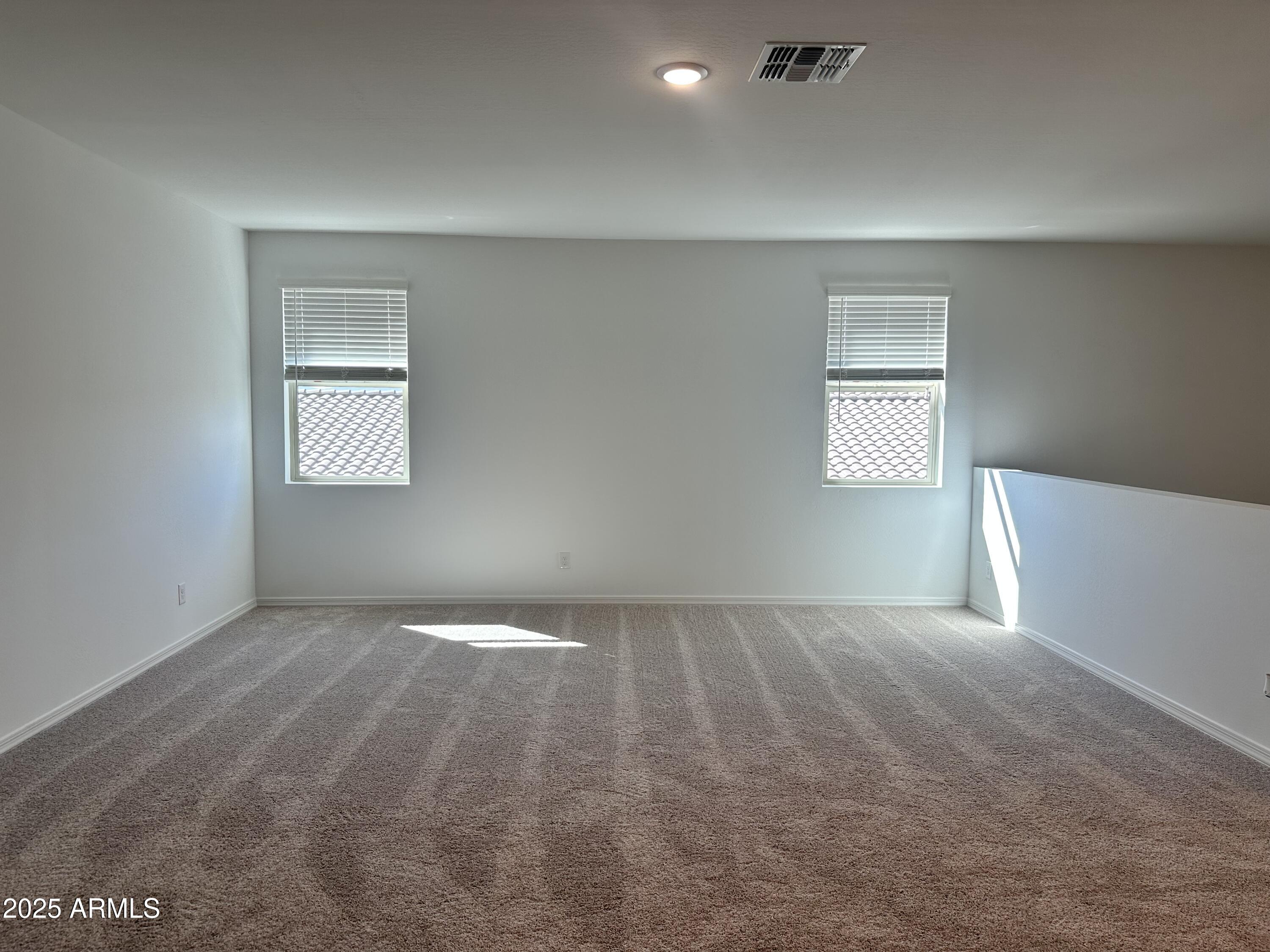 5535 West Hopi Trail Laveen, AZ 85339 - Photo 20 of 45 a view of an empty room and window