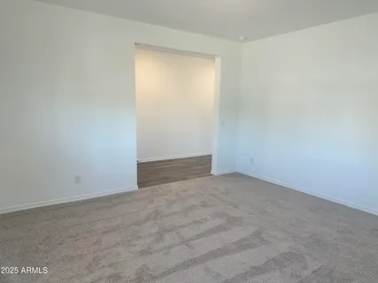 an empty room with an entryway
