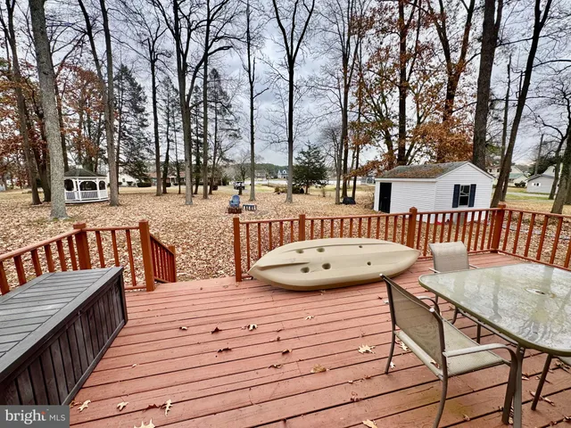 a view of a chairs on a deck