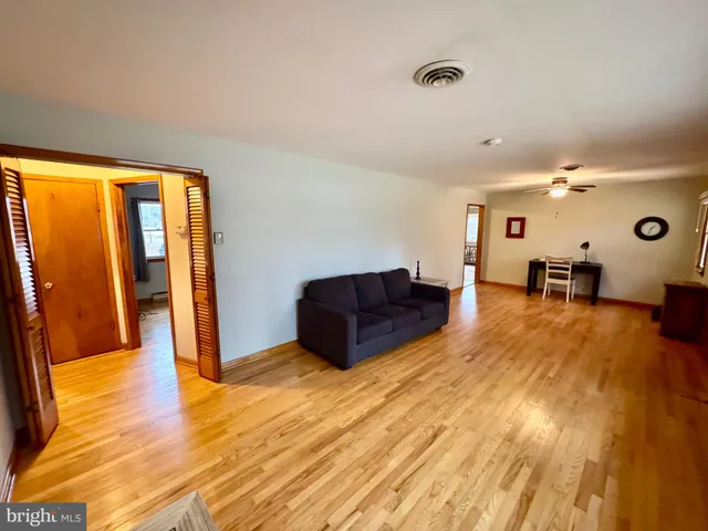 a bed room with a bed and a chandelier