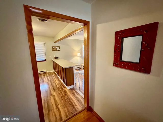 a bed room with a bed and furniture