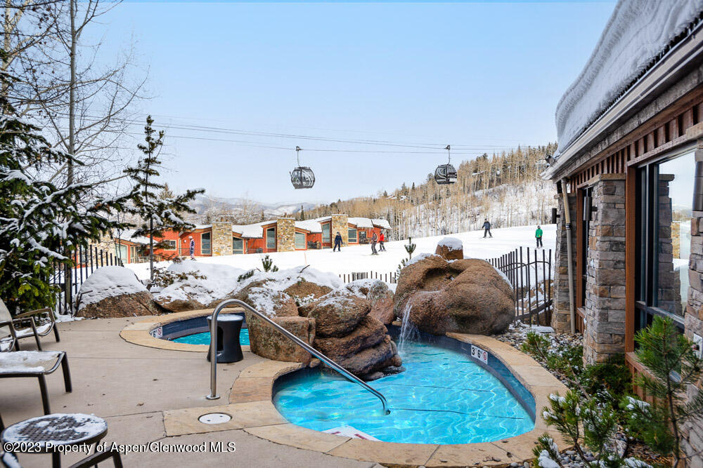 400 Wood Road, Unit 2113H Snowmass Village, CO 81615 - Photo 8 of 12 Slopeside Hot Tub