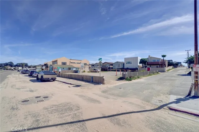 a view of a living room and kitchen
