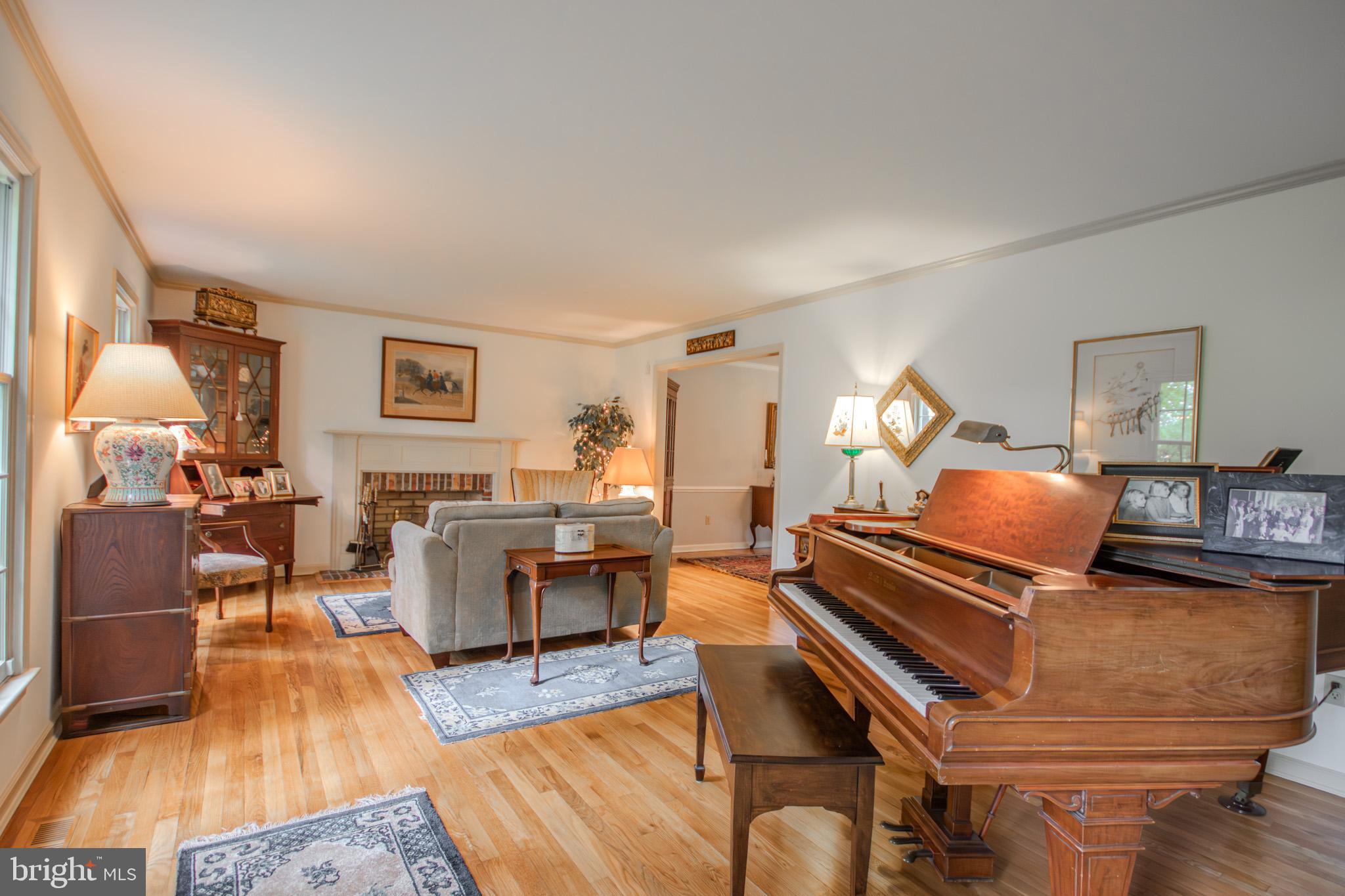 29745 Jackson Road Salisbury, MD 21804 - Photo 18 of 77 Living room with grand piano