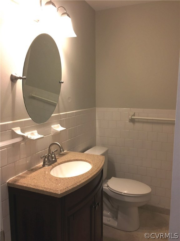 7820 Conifer Road North Chesterfield, VA 23237 - Photo 13 of 24 Hall bathroom has new vanity and ceramic floor.