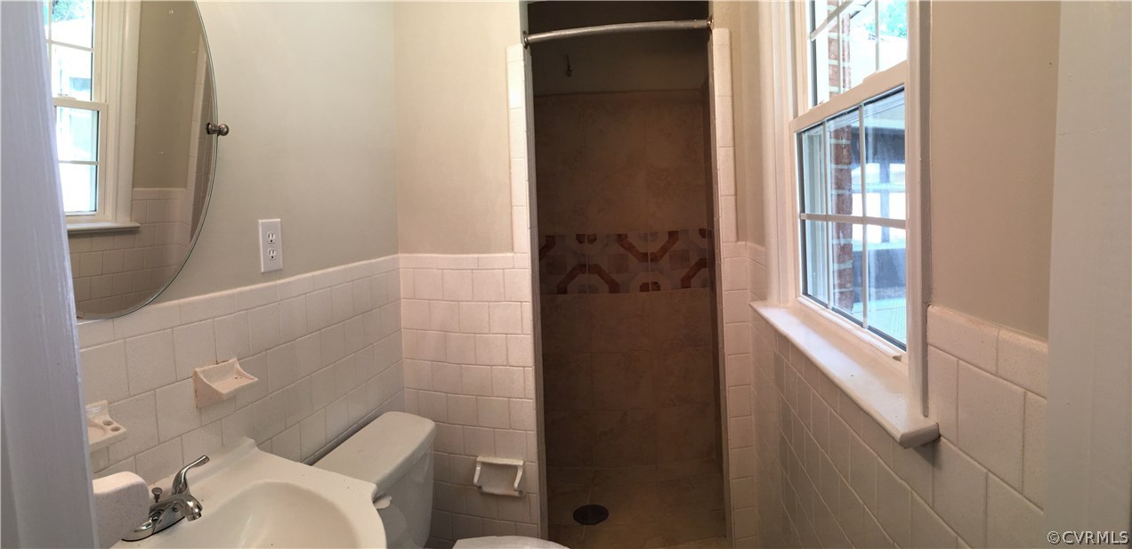 7820 Conifer Road North Chesterfield, VA 23237 - Photo 17 of 24 The master bathroom has a ceramic tiled shower.