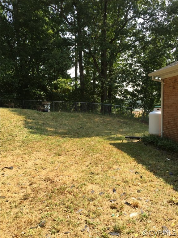 7820 Conifer Road North Chesterfield, VA 23237 - Photo 21 of 24 The side portion of the back yard.
