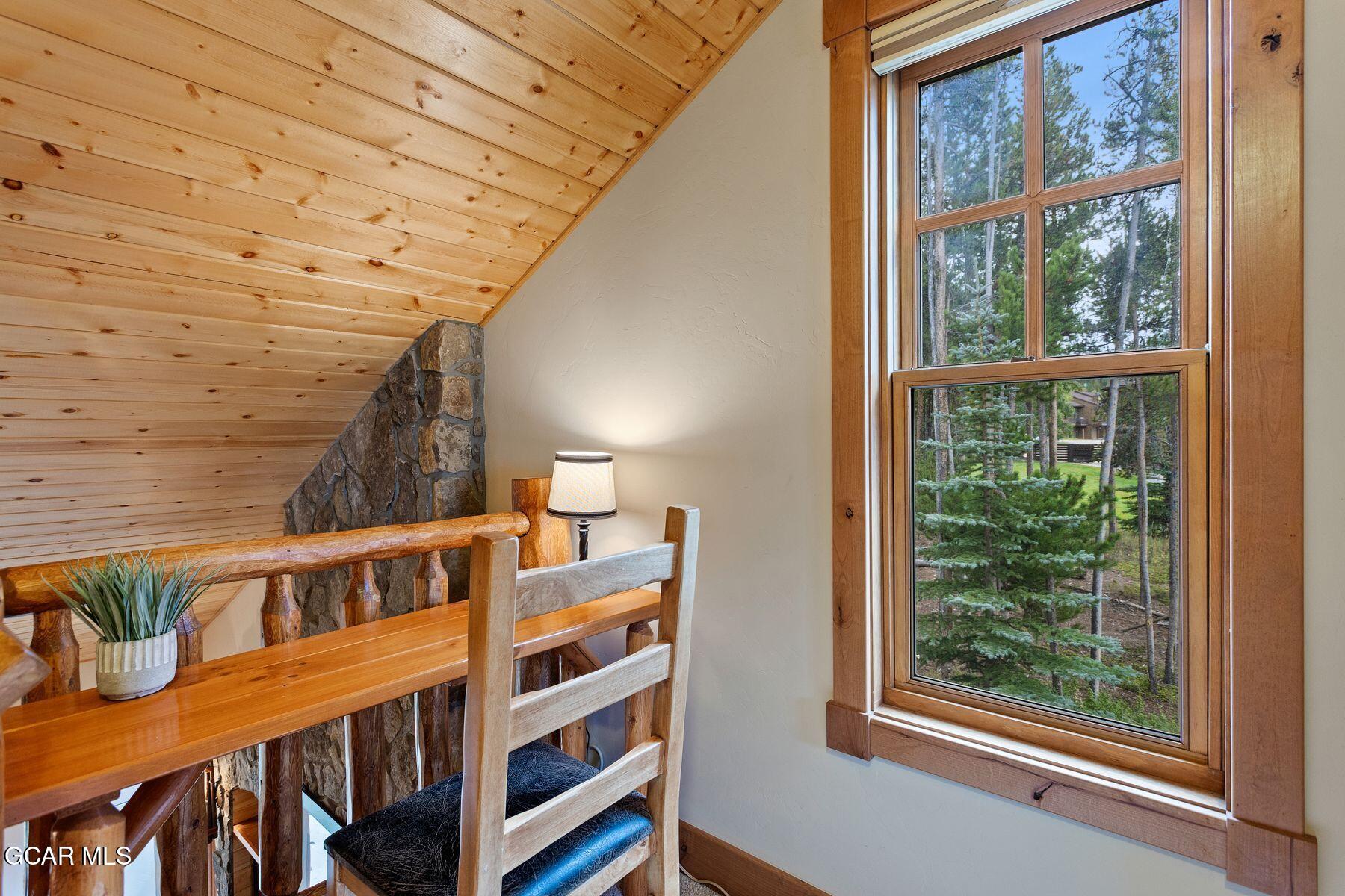 445 Trappers Way Fraser, CO 80442 - Photo 21 of 37 a view of a hallway with windows