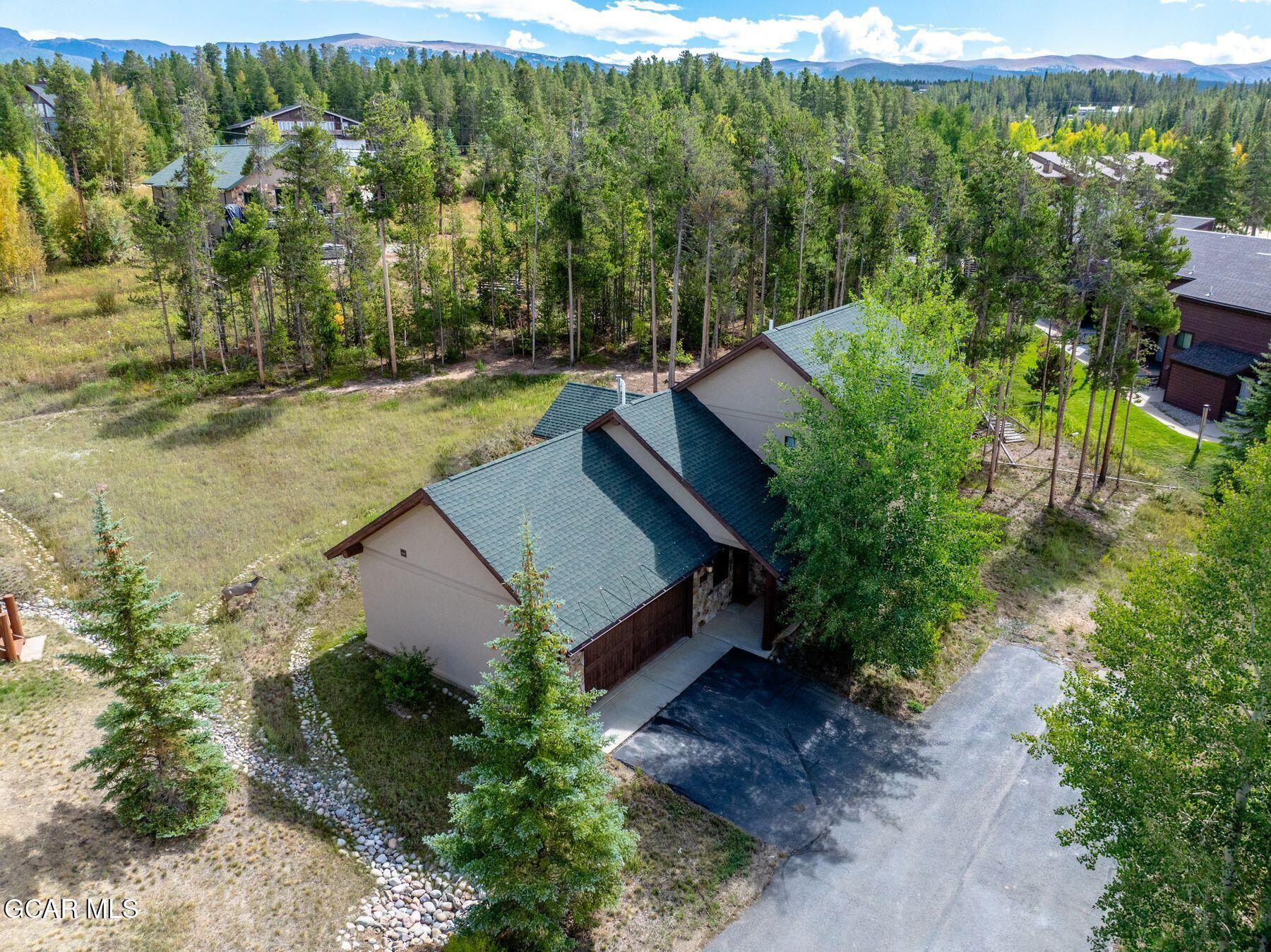 445 Trappers Way Fraser, CO 80442 - Photo 37 of 37 an aerial view of a house with a yard