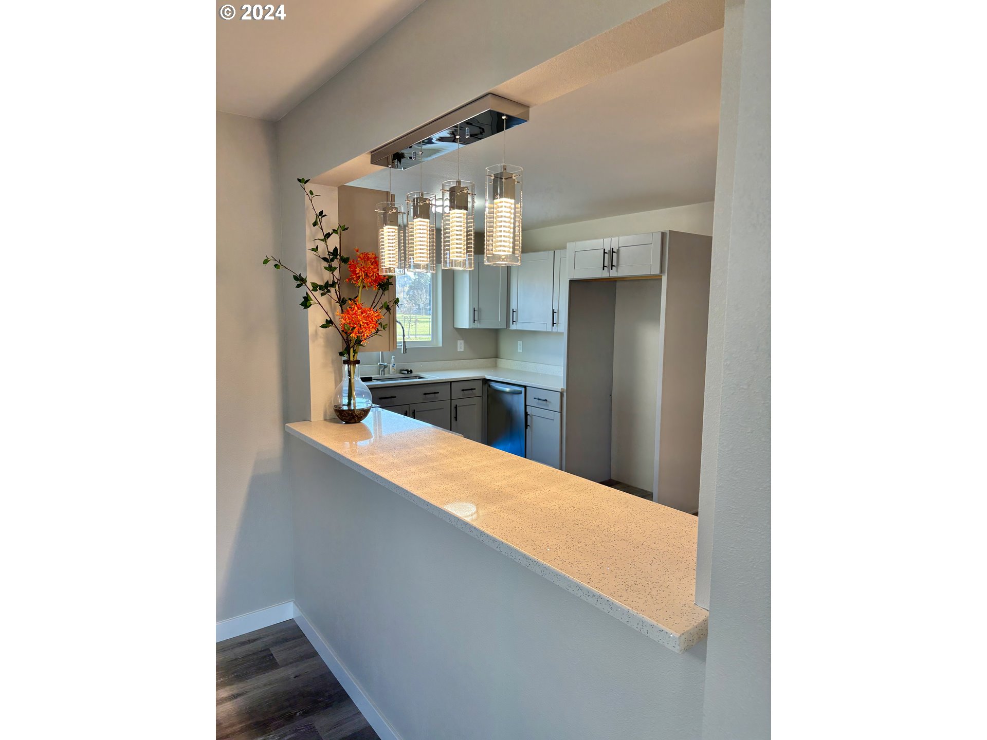 2140 J Street Springfield, OR 97477 - Photo 9 of 23 a view of a kitchen with a sink